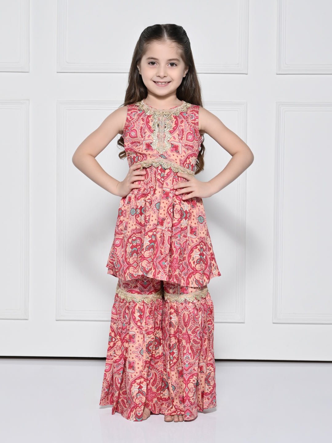 Peach and Pink Abstract – A Peach and Pink Sleeveless Rayon Suit for Girls