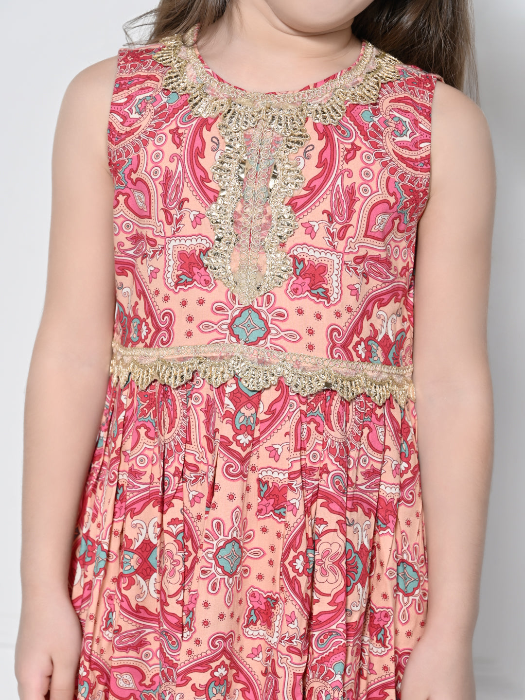 Peach and Pink Abstract – A Peach and Pink Sleeveless Rayon Suit for Girls